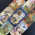 картинка Карты Таро "Everyday Witch Tarot" Reprint / Повседневное Таро Ведьмы TAROMANIA магазин Gamesdealer.ru являющийся официальным дистрибьютором в России картинка Карты Таро "Everyday Witch Tarot" Reprint / Повседневное Таро Ведьмы TAROMANIA от магазина Gamesdealer.ru